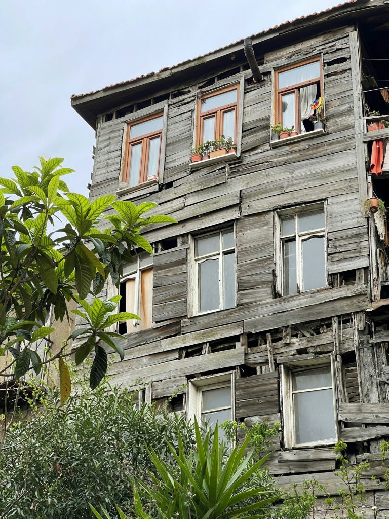City life, Old wooden dilapidated house, but still inhabited house, Istanbul, Turkey